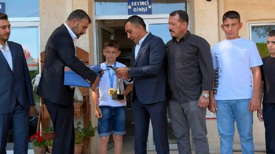 ÜLKÜ OCAKLARI’NDAN ŞAMPİYON PEHLİVAN YUSUF EYMEN ARLI’YA TEBRİK